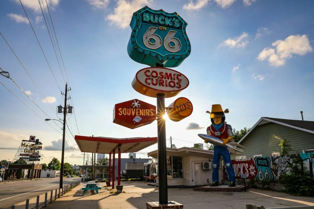 A souvenir shop with a neon sign located along Route 66